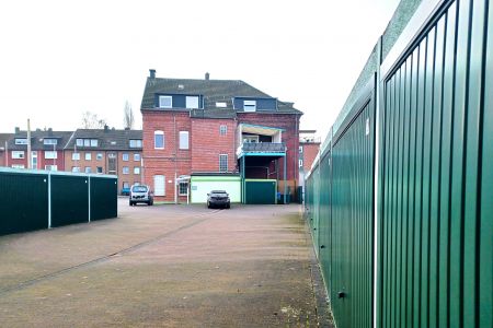 Garagenhof + Haus